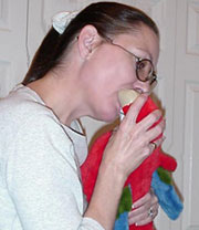 Tilt, seal lips over beak, block nares with forefinger and puff breath